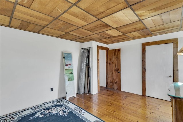 unfurnished room featuring hardwood / wood-style floors