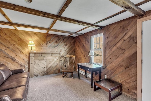 sitting room with beam ceiling, a barn door, carpet floors, and coffered ceiling