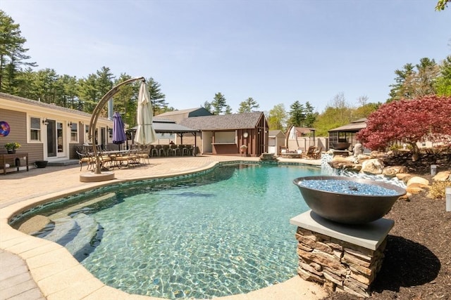 115 Lincoln Rd, Walpole, MA 02081 - pool with outdoor dining space, a gazebo, an outdoor structure, and a patio area