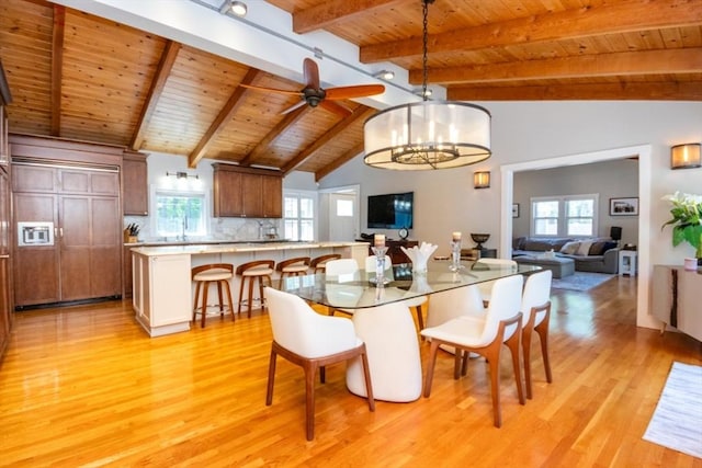 115 Lincoln Rd, Walpole, MA 02081 - dining area featuring vaulted ceiling with beams, wood ceiling, light wood finished floors, and ceiling fan with notable chandelier