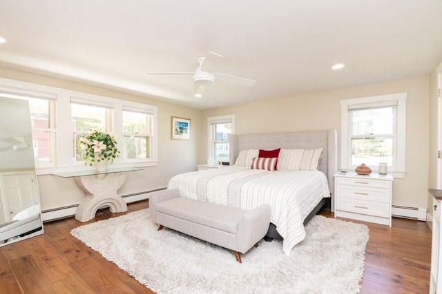 115 Lincoln Rd, Walpole, MA 02081 - bedroom featuring recessed lighting, a baseboard radiator, and wood finished floors