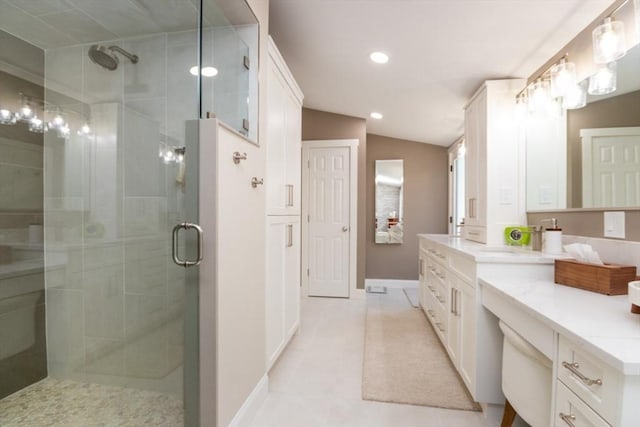 115 Lincoln Rd, Walpole, MA 02081 - bathroom with vanity, tile patterned floors, recessed lighting, baseboards, and a shower stall