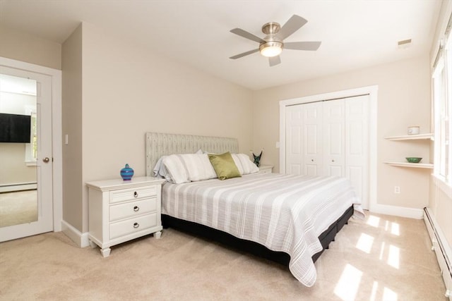 115 Lincoln Rd, Walpole, MA 02081 - bedroom with a closet, light colored carpet, and a baseboard radiator
