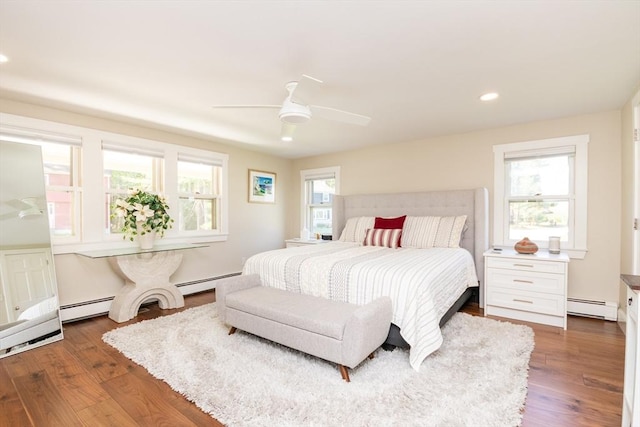 115 Lincoln Rd, Walpole, MA 02081 - bedroom featuring dark wood-style flooring, recessed lighting, and baseboard heating