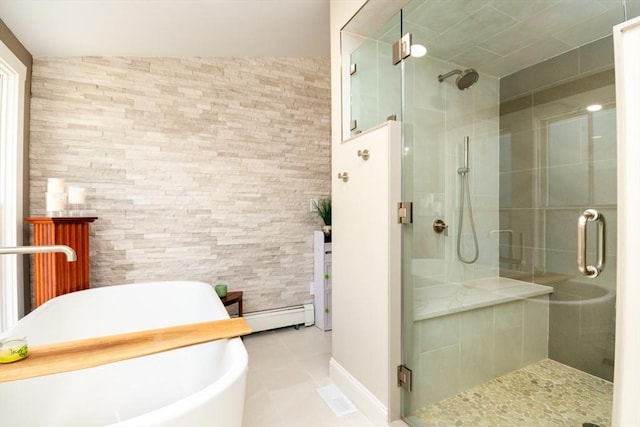 115 Lincoln Rd, Walpole, MA 02081 - bathroom with a freestanding tub, a baseboard radiator, a stall shower, and tile patterned flooring