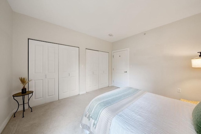519 Harrison Ave Unit D421, Boston, MA 02118 - carpeted bedroom with two closets and baseboards