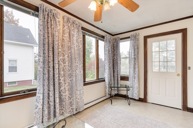 sunroom featuring ceiling fan