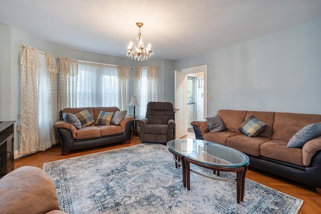 living room with an inviting chandelier