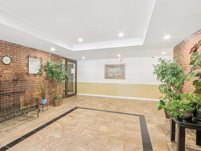 881 Broadway Unit 16, Everett, MA 02149 - building lobby with brick wall and recessed lighting