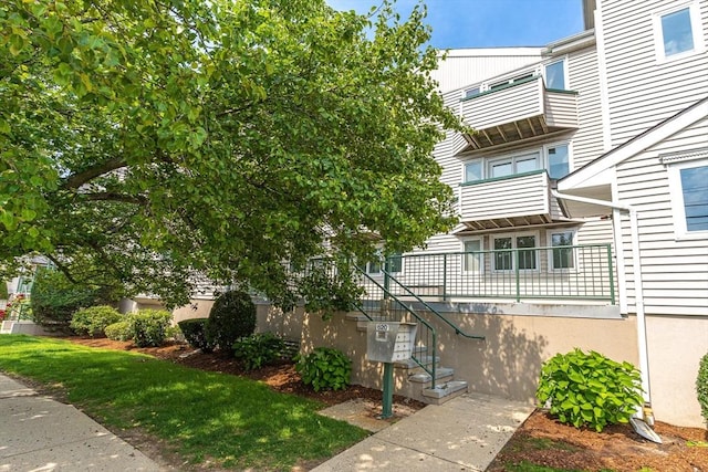 view of front of home with stairway