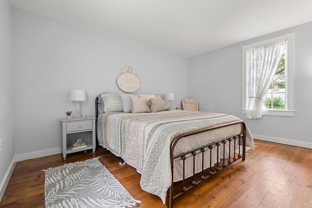 bedroom featuring wood-type flooring