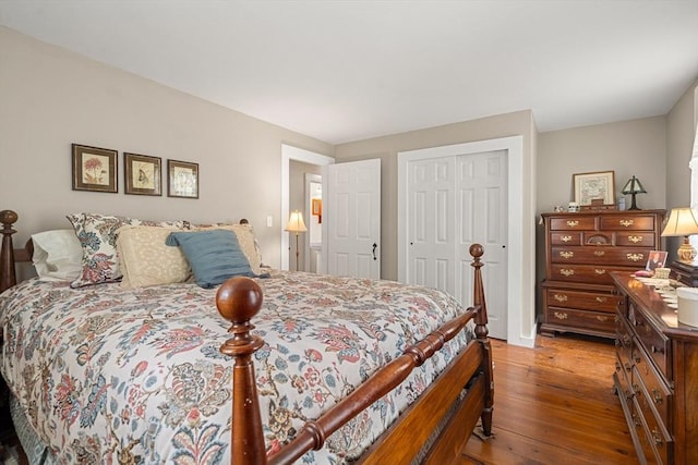 bedroom featuring a closet and hardwood / wood-style flooring