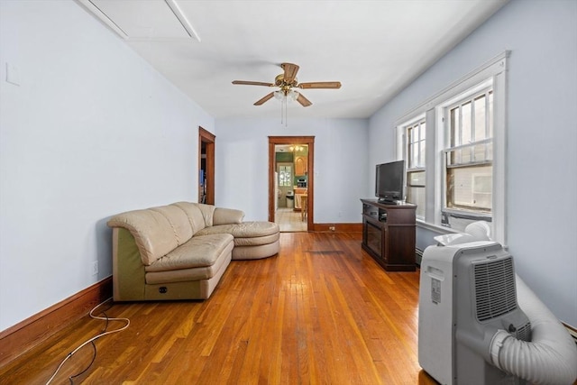 23 Essex St, Revere, MA 02151 - living room featuring attic access, a ceiling fan, and light wood-style floors