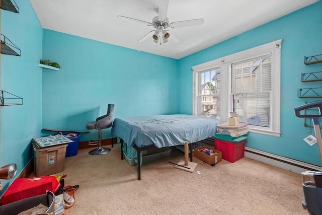 23 Essex St, Revere, MA 02151 - carpeted bedroom with a baseboard radiator and a ceiling fan