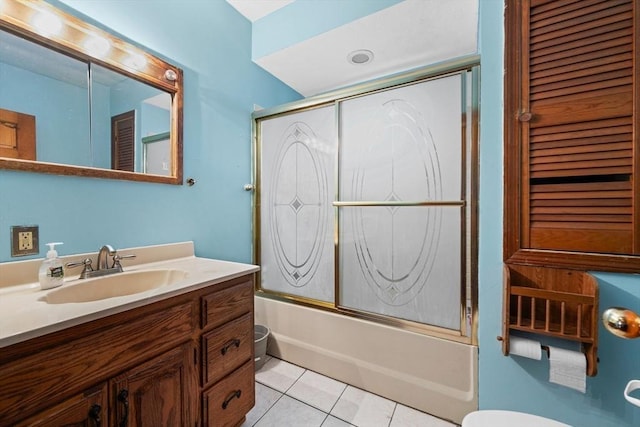 23 Essex St, Revere, MA 02151 - bathroom featuring vanity, combined bath / shower with glass door, and tile patterned flooring