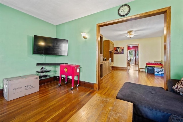 23 Essex St, Revere, MA 02151 - living area featuring wood finished floors and a ceiling fan