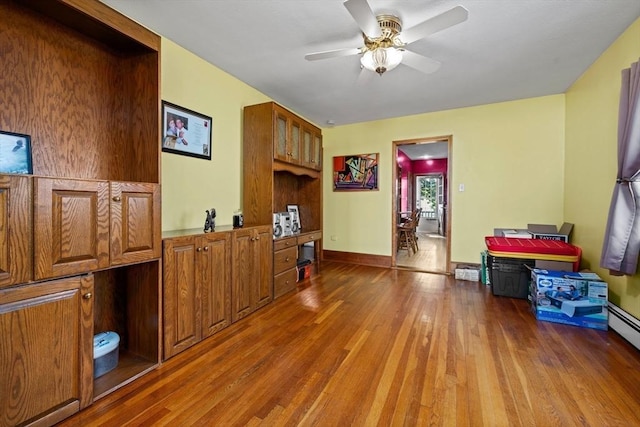 23 Essex St, Revere, MA 02151 - living area with wood finished floors and ceiling fan
