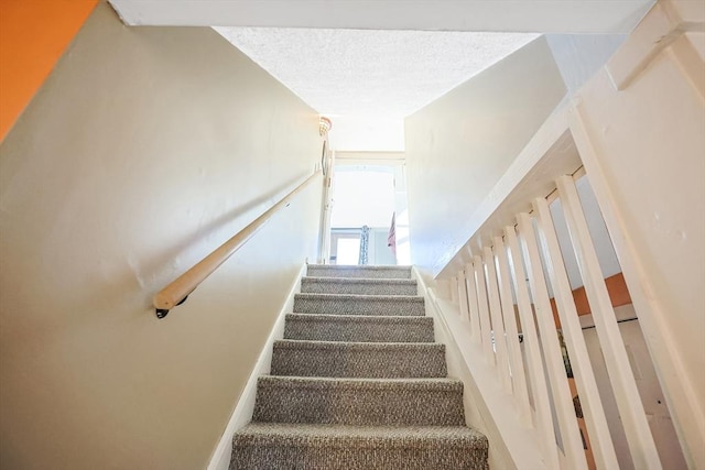 8 Scotia St, Salem, MA 01970 - stairway featuring a textured ceiling
