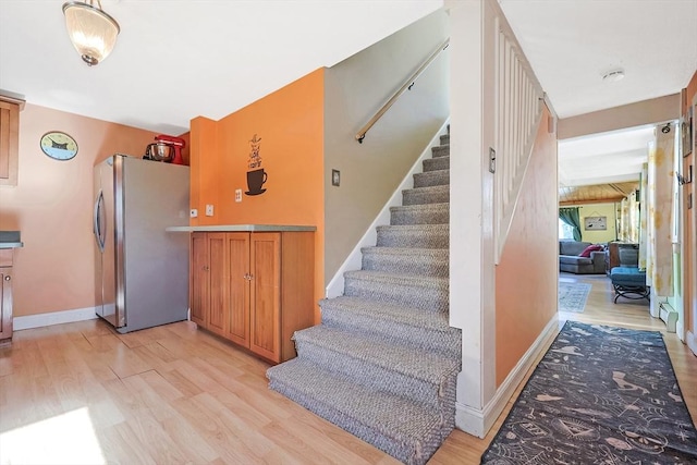 8 Scotia St, Salem, MA 01970 - stairs featuring wood finished floors and baseboards