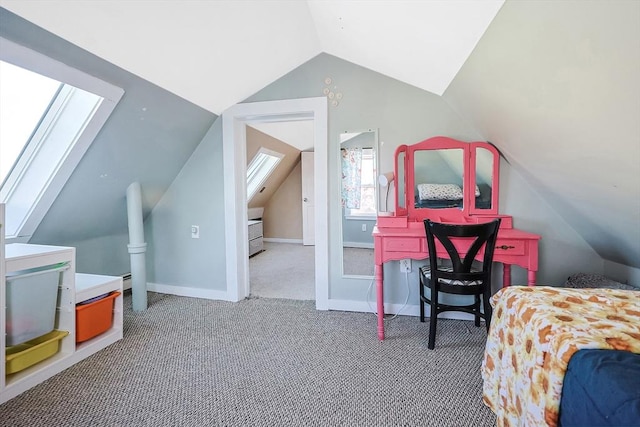 8 Scotia St, Salem, MA 01970 - carpeted bedroom featuring vaulted ceiling, a skylight, and baseboards