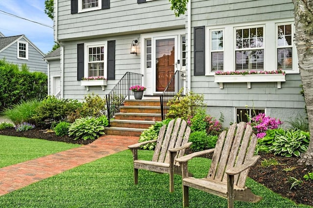 42 Pickwick Rd, Marblehead, MA 01945 - property entrance featuring a lawn