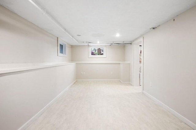 42 Pickwick Rd, Marblehead, MA 01945 - below grade area with baseboards and wood finished floors
