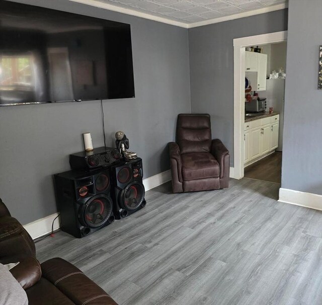 68 Temple St, Haverhill, MA 01832 - sitting room featuring wood finished floors and crown molding