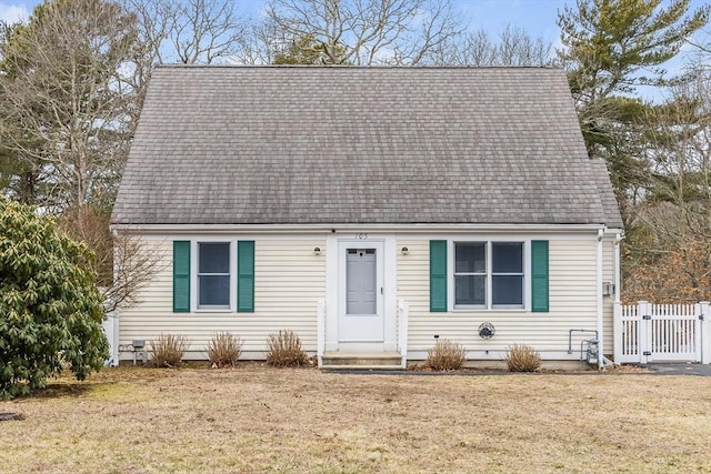 105 Edgewater Dr W, Falmouth, MA 02536 - cape cod home featuring a gate, a shingled roof, and a front yard
