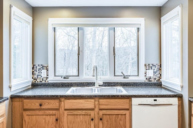 105 Edgewater Dr W, Falmouth, MA 02536 - kitchen featuring dishwasher, dark countertops, and a sink