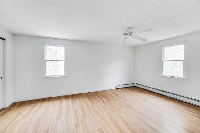 105 Edgewater Dr W, Falmouth, MA 02536 - unfurnished room with baseboards, wood finished floors, ceiling fan, and a healthy amount of sunlight