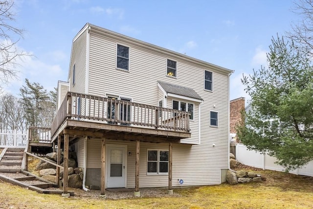 105 Edgewater Dr W, Falmouth, MA 02536 - rear view of property featuring a wooden deck and stairway