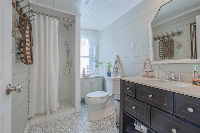 bathroom featuring vanity, toilet, walk in shower, and wooden walls