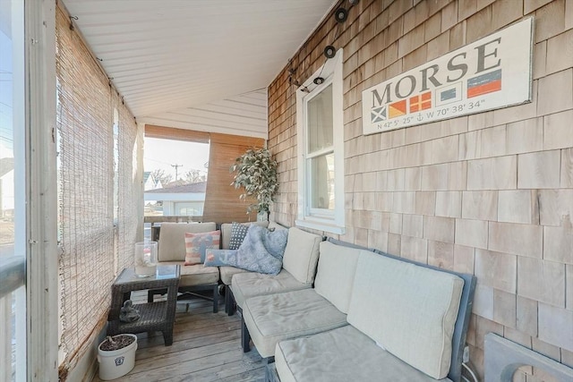 sunroom with lofted ceiling