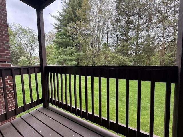 deck featuring a lawn