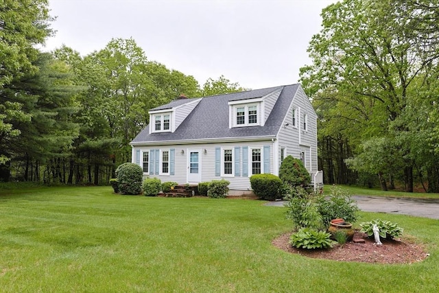 119 Messenger St, Plainville, MA 02762 - view of front of property with a front yard, roof with shingles, and a chimney