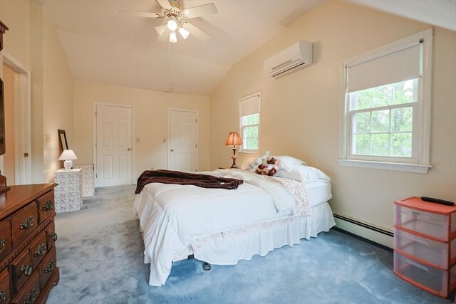 119 Messenger St, Plainville, MA 02762 - carpeted bedroom with a baseboard radiator, a wall mounted AC, lofted ceiling, and a ceiling fan