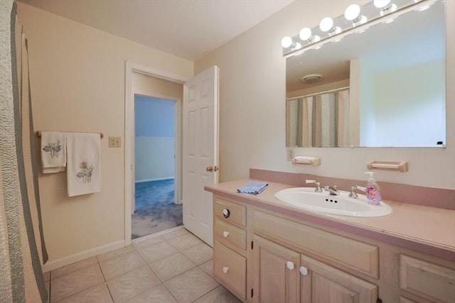 119 Messenger St, Plainville, MA 02762 - bathroom with tile patterned flooring, vanity, and baseboards