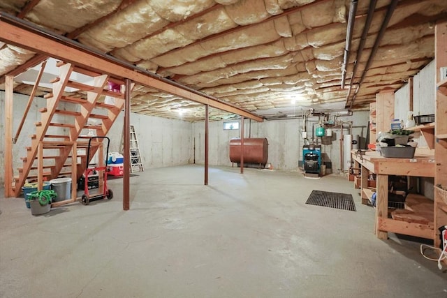 119 Messenger St, Plainville, MA 02762 - unfinished below grade area with heating fuel, a heating unit, and stairway