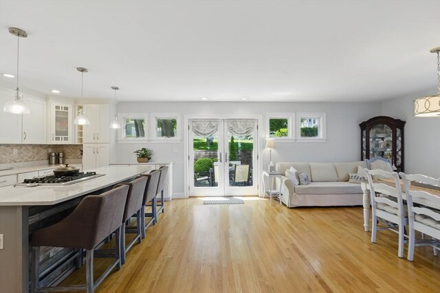 96 Sea Ave, Quincy, MA 02169 - living area featuring recessed lighting, light wood-style floors, and french doors