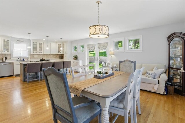 96 Sea Ave, Quincy, MA 02169 - dining area with light wood finished floors, french doors, and recessed lighting