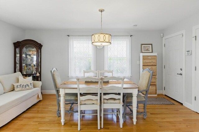 96 Sea Ave, Quincy, MA 02169 - dining room with light wood-style flooring and baseboards