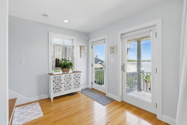 96 Sea Ave, Quincy, MA 02169 - foyer entrance with wood finished floors, baseboards, and recessed lighting