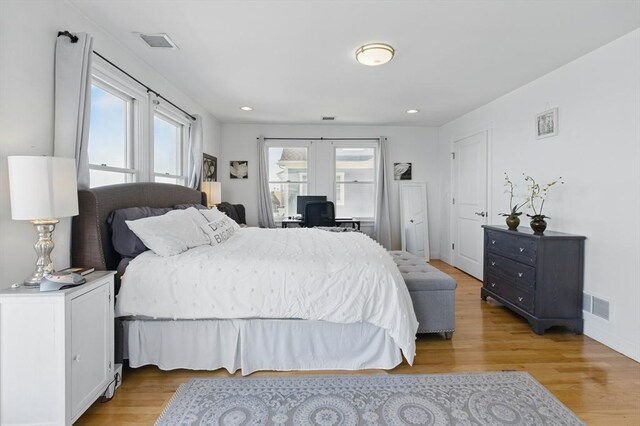 96 Sea Ave, Quincy, MA 02169 - bedroom with light wood finished floors, an office area, and recessed lighting