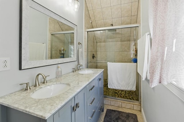 96 Sea Ave, Quincy, MA 02169 - full bathroom featuring a shower stall, double vanity, and tile patterned flooring