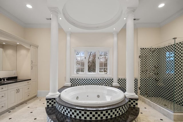 bathroom featuring decorative columns, vanity, independent shower and bath, and ornamental molding