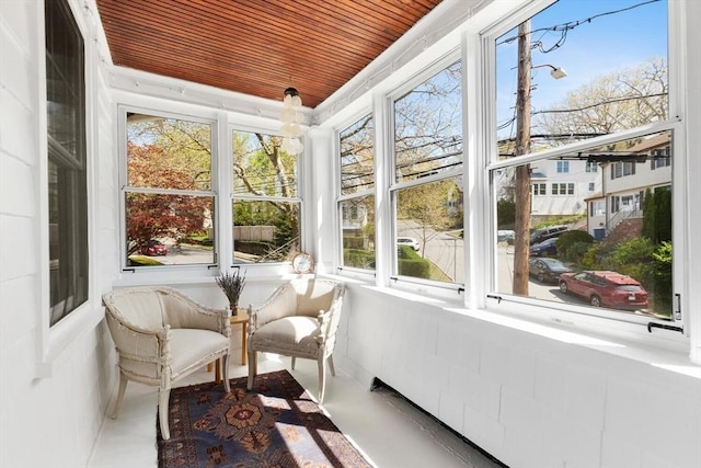 sunroom with wood ceiling