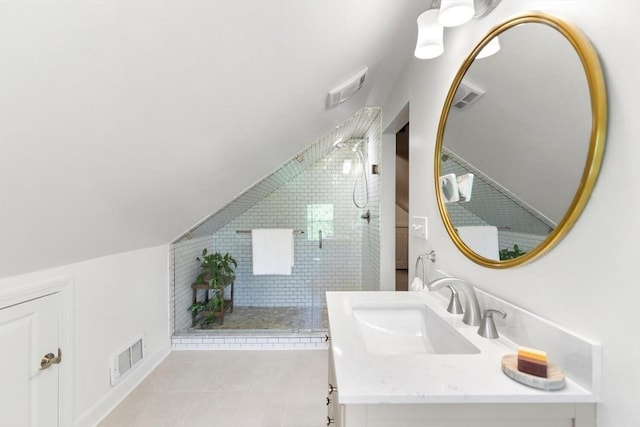 full bath featuring visible vents, tile patterned flooring, and tiled shower