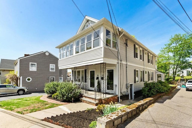 traditional style home with covered porch