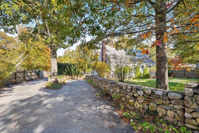 surrounding community featuring fence