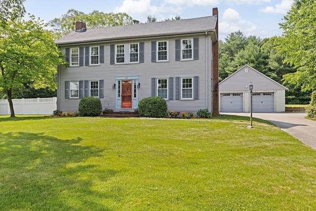 553 Center St, Hanover, MA 02339 - colonial house featuring a chimney, a garage, and an outdoor structure